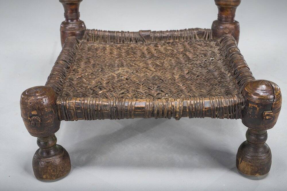 Early 20th century handmade low cedar chair, Nuristan, 1890s