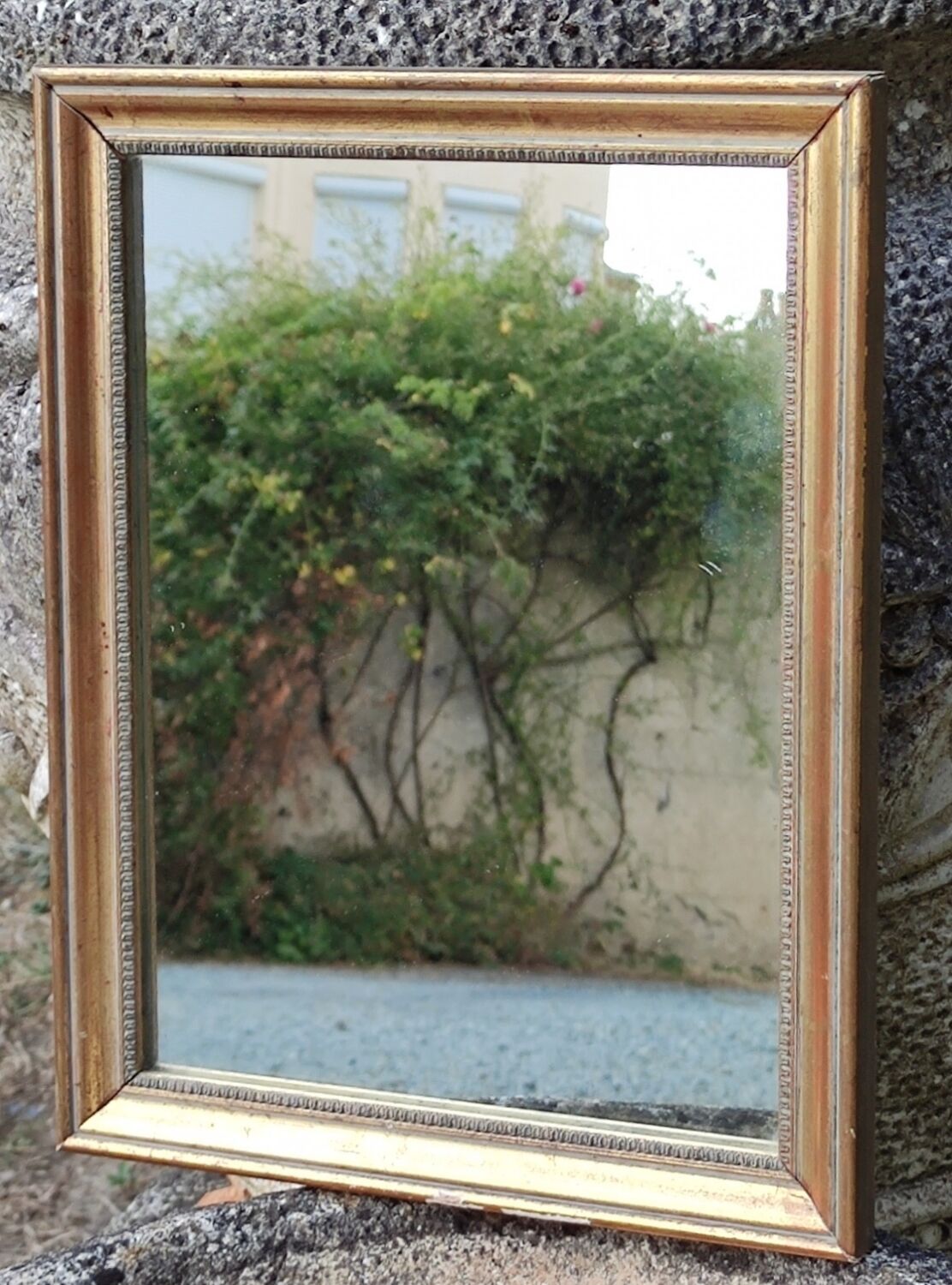 Old little gilded mirror