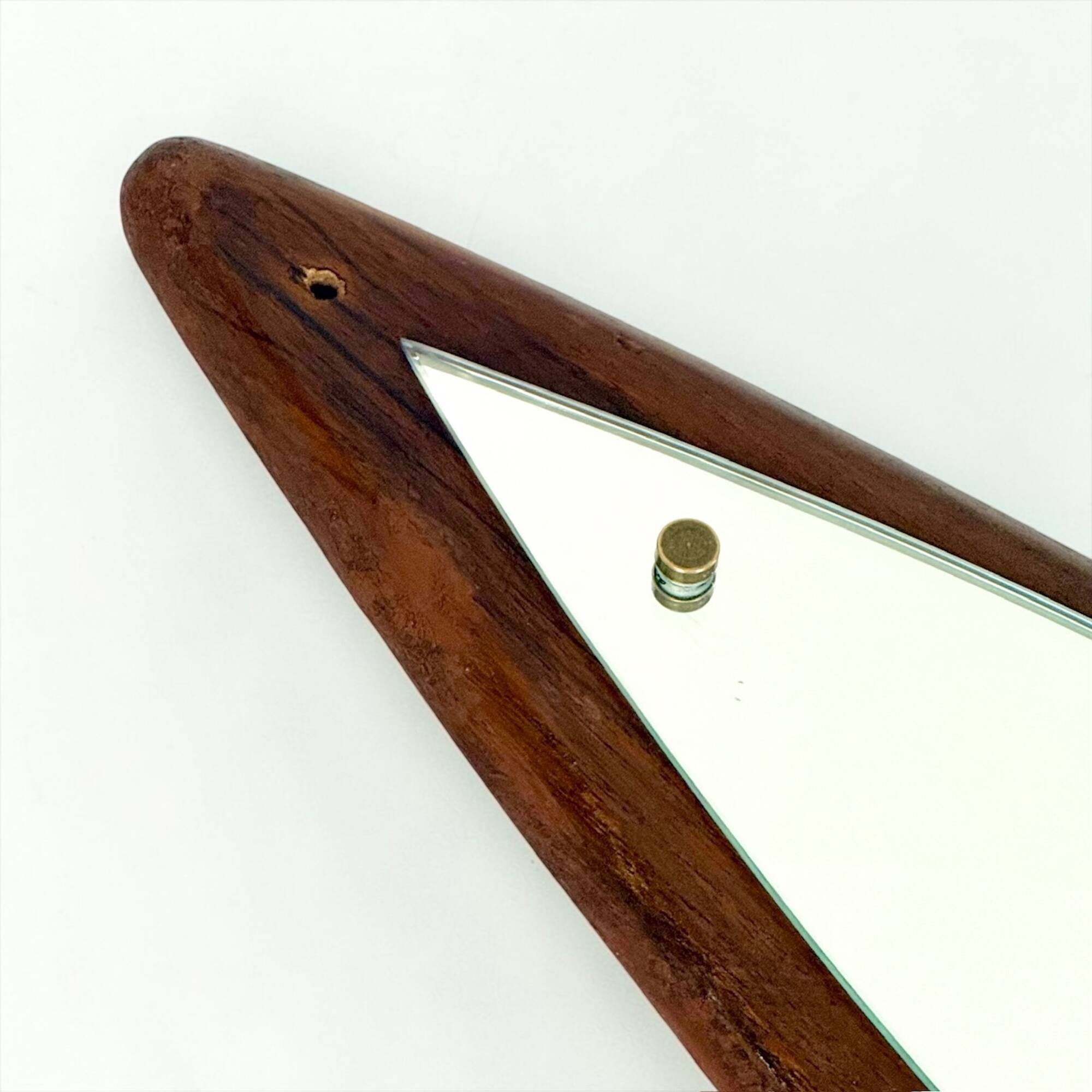 Italian sculptural wall mirror in wood from the 1960s.