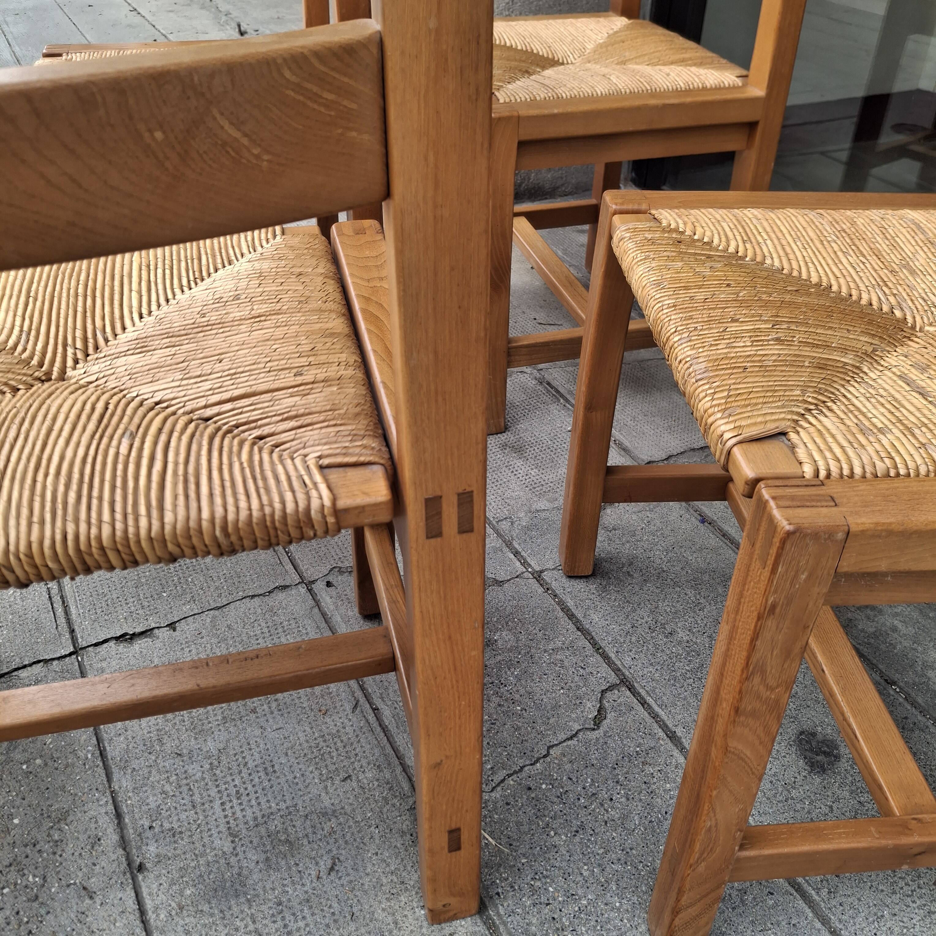 Set of four regaining chairs in elm. 1970