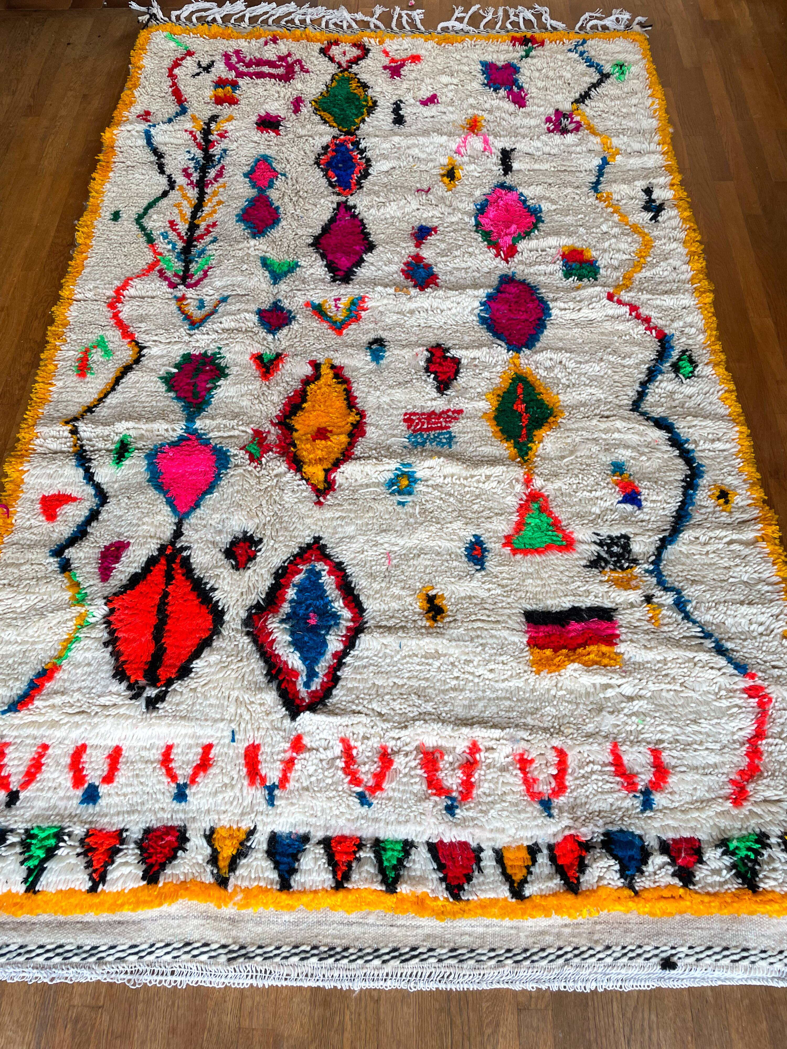 Berber carpet azimuth colored white with multicolored and fluorescent patterns