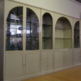 Showcases in lacquered wood, glass and brass  1970s, set of 4