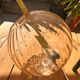 Suspension Boule en verre texturé ambré 29 cm