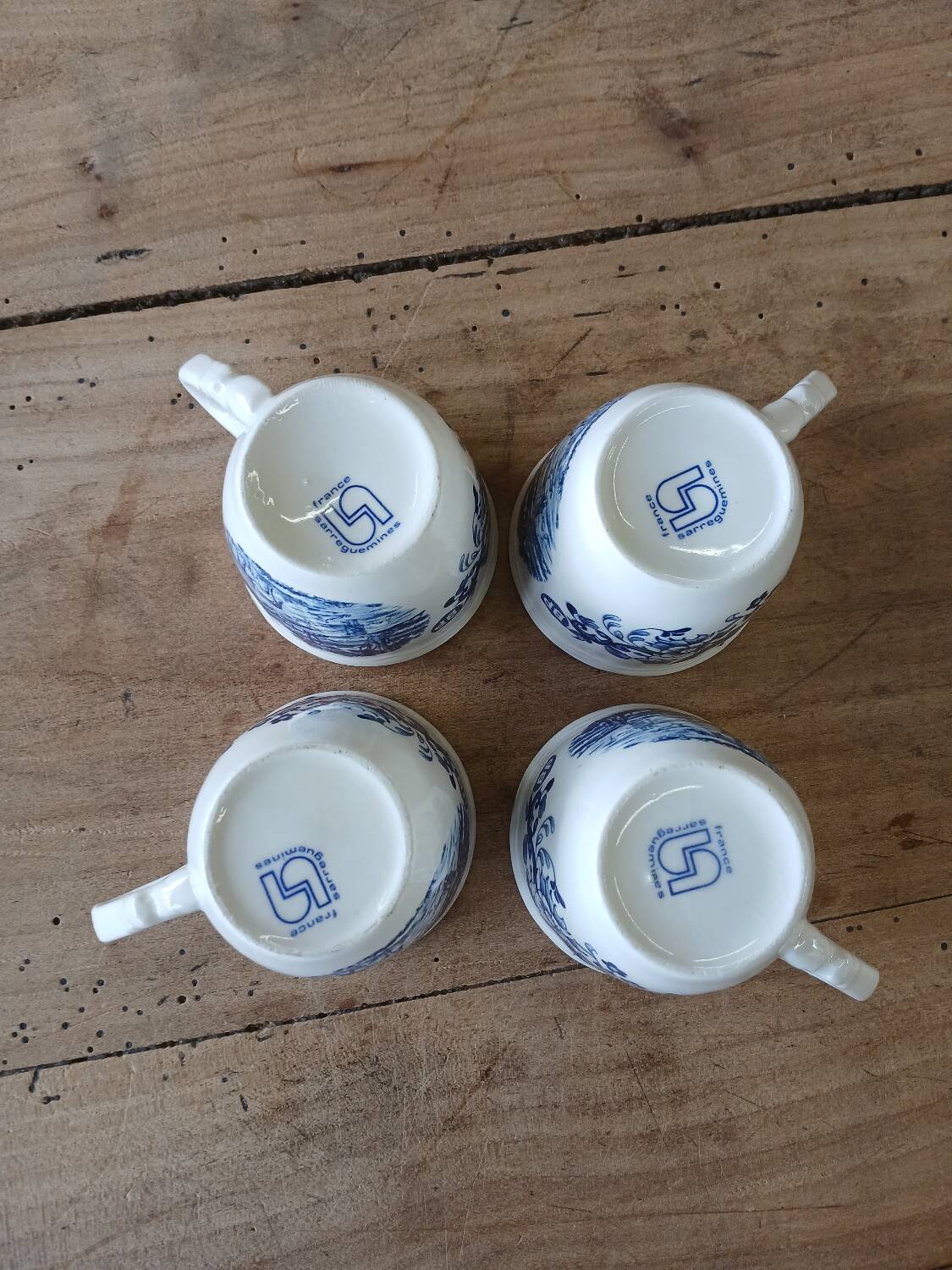 4 antique cups and saucers