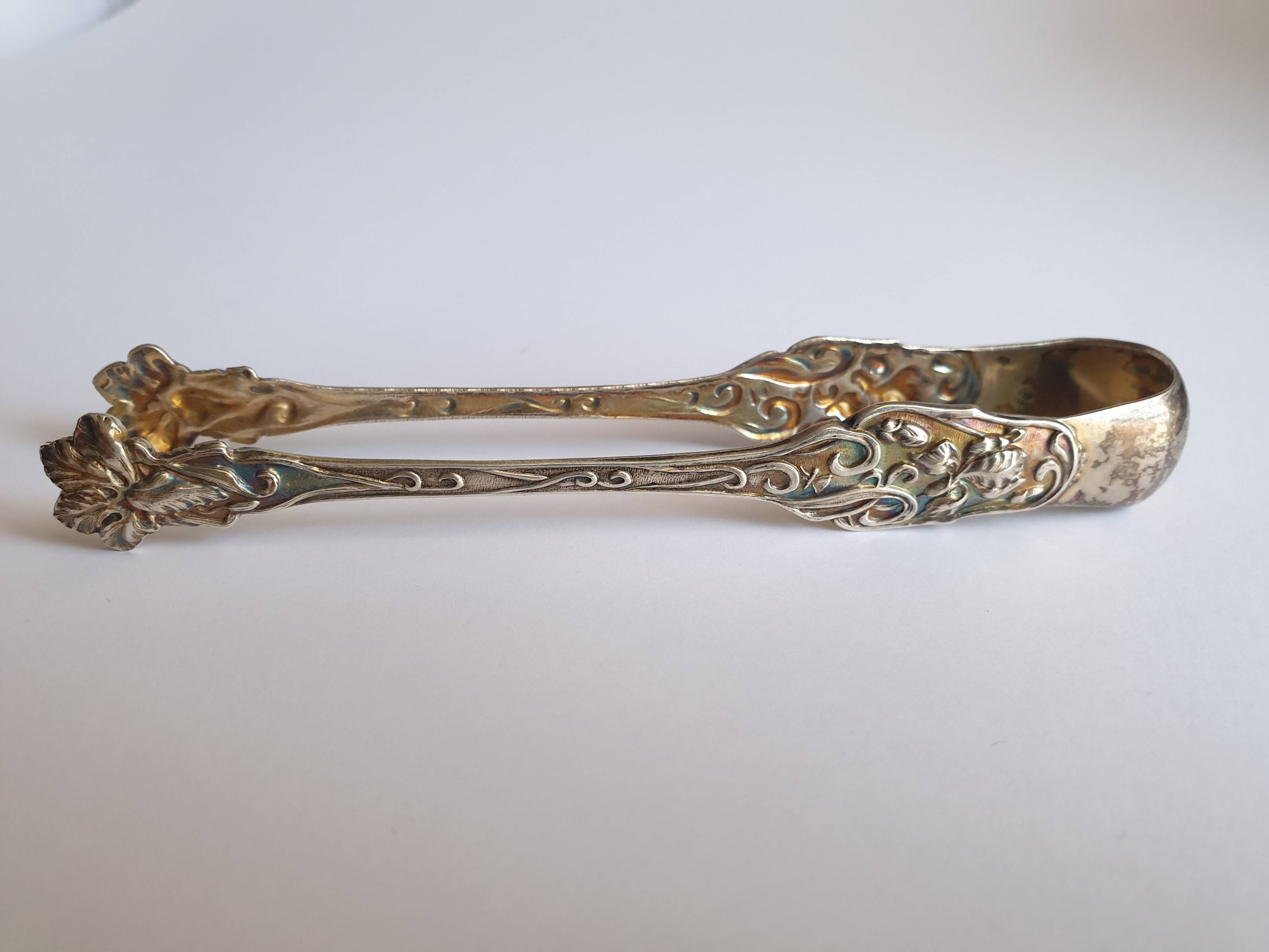 Art Nouveau sugar tongs in solid silver and vermeil