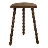 Tripod stool made of turned wood