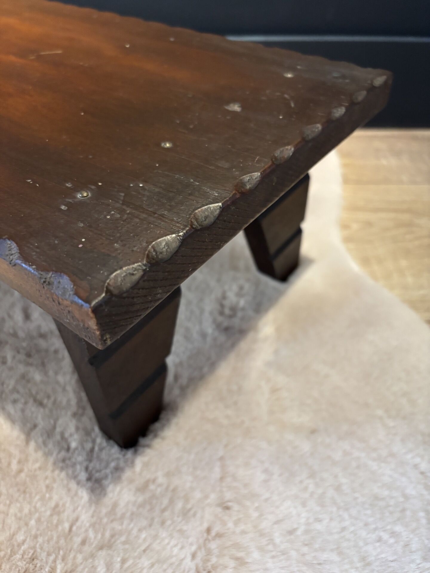 Small antique bench in wenge wood