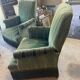 Set of two green velvet toad armchairs with fringe