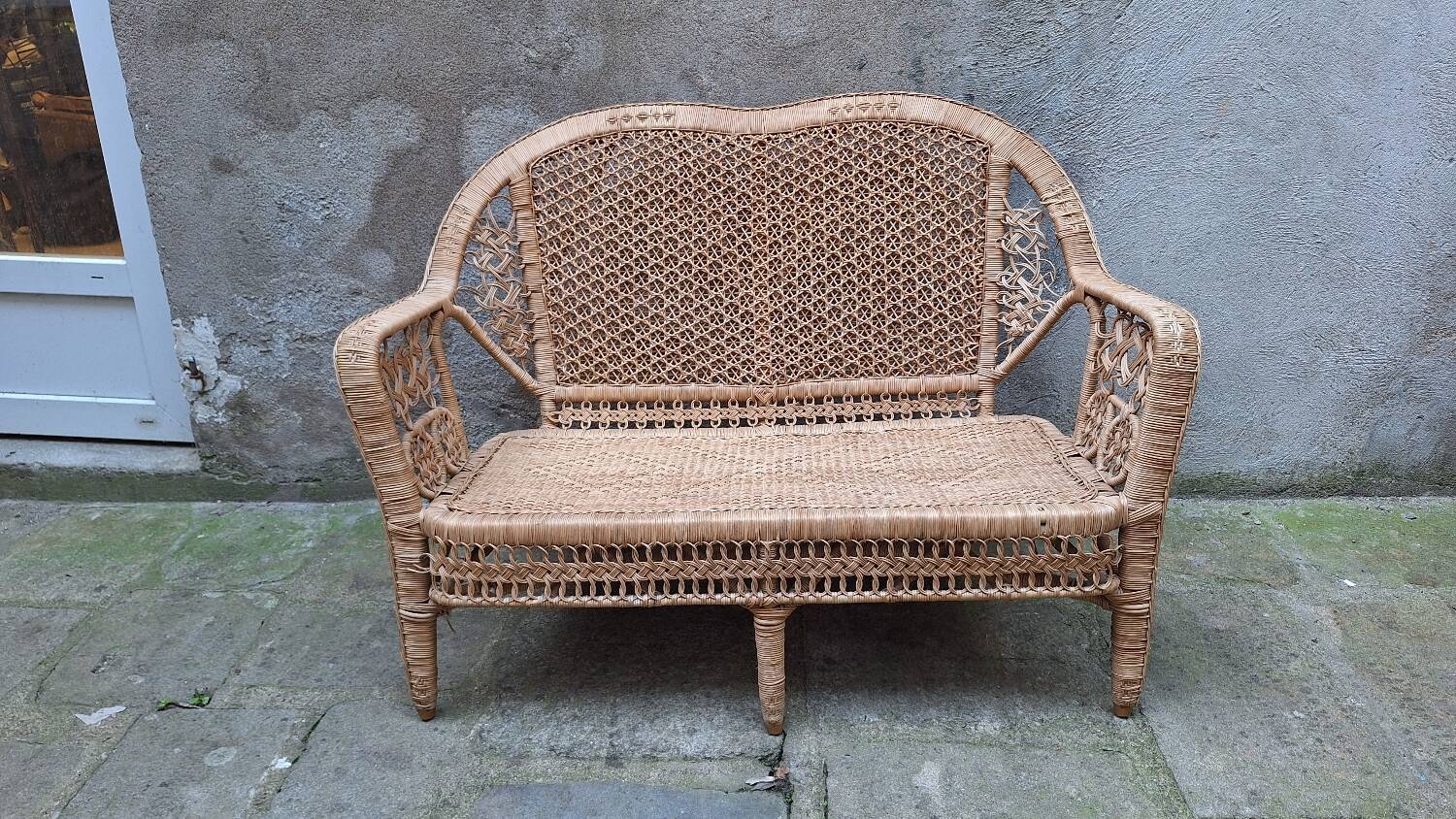 Peacock rattan garden set with bench and armchair