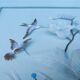 Two vintage paintings made with feathers, hummingbird motif