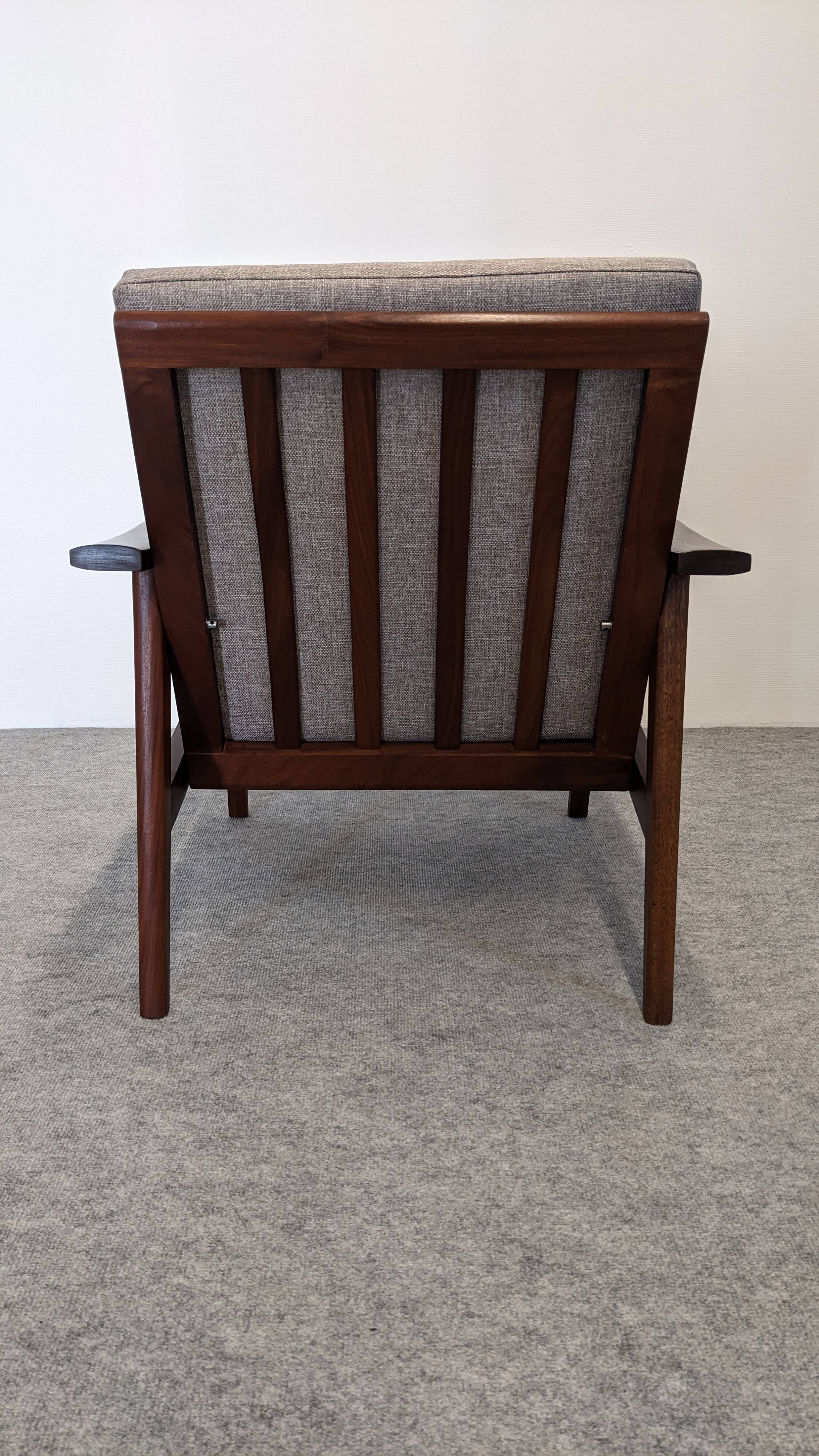 Scandinavian style armchair in teak, Eastern Europe around 1950.
