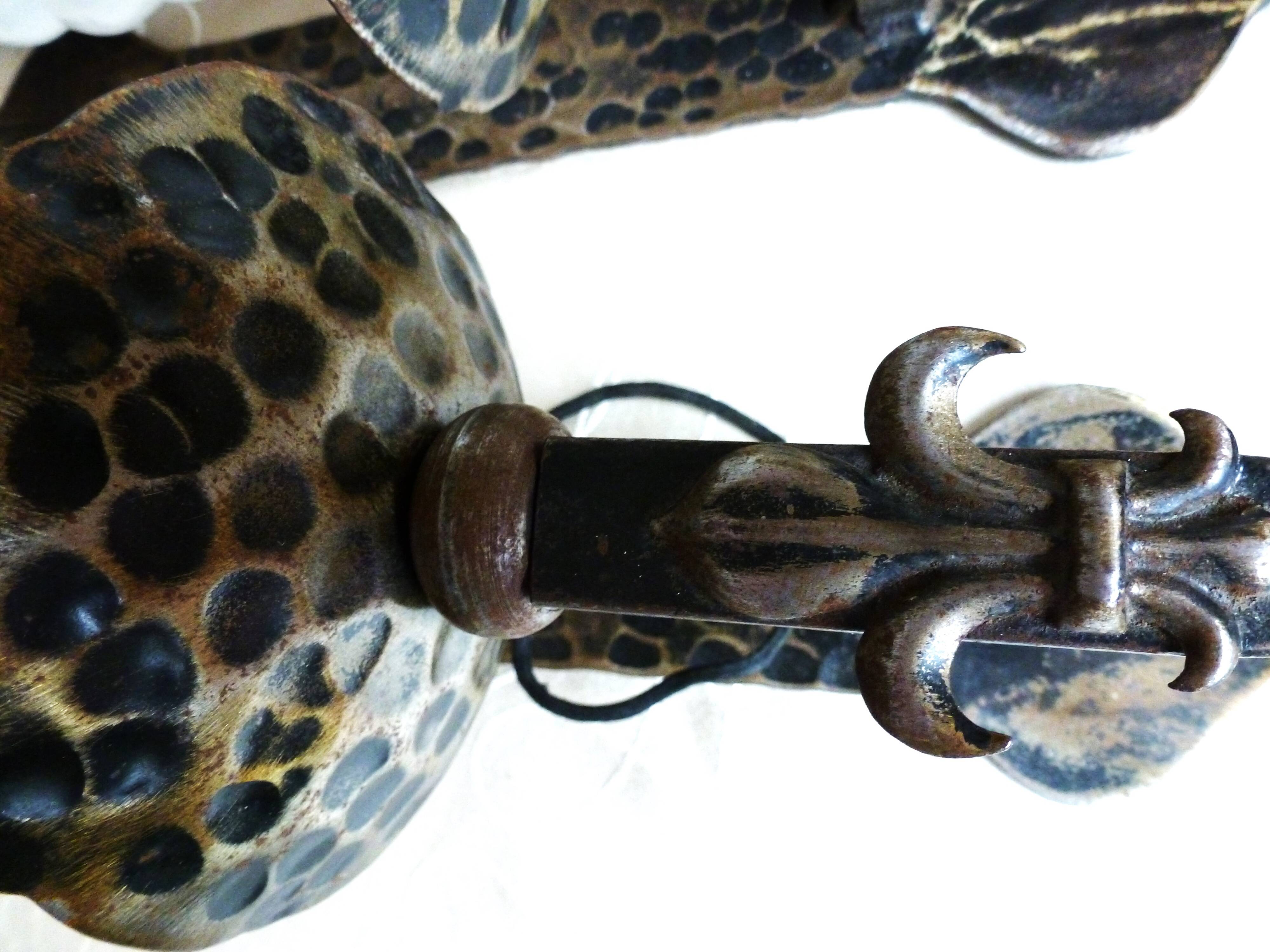 Medieval wrought iron wall lights / antique medieval lighting.