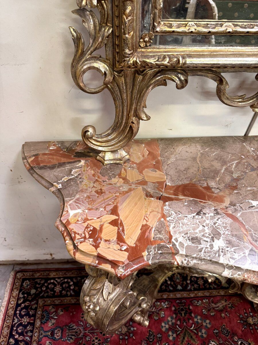 Important console table with a curved shape + Louis XV style mirror in gilded and silvered wood.