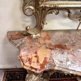 Important console table with a curved shape + Louis XV style mirror in gilded and silvered wood.