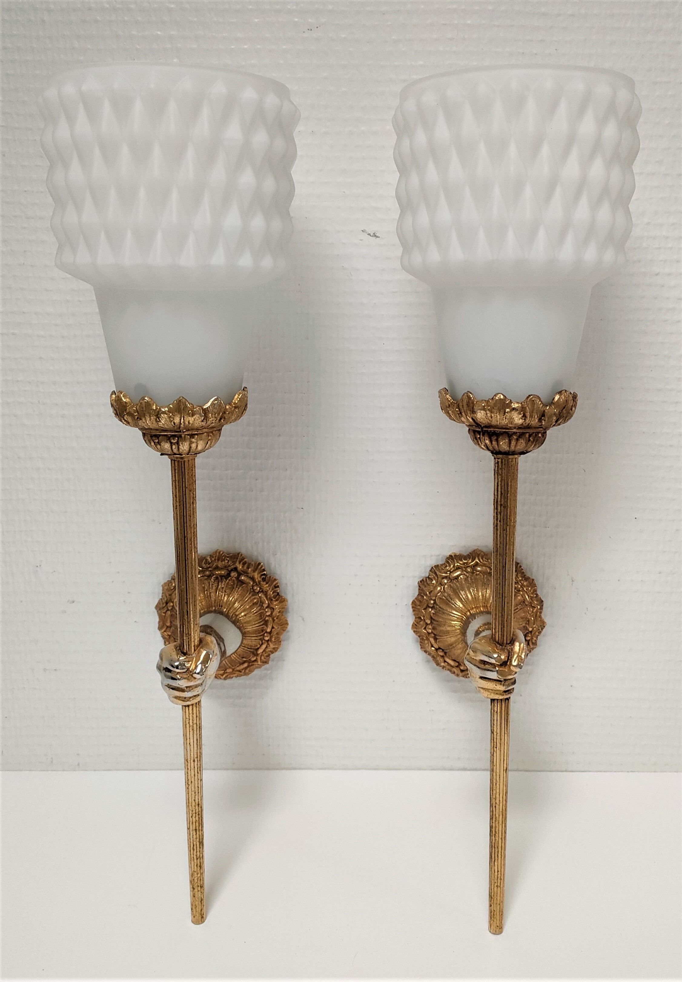 Pair of vintage patinated golden metal hand sconces