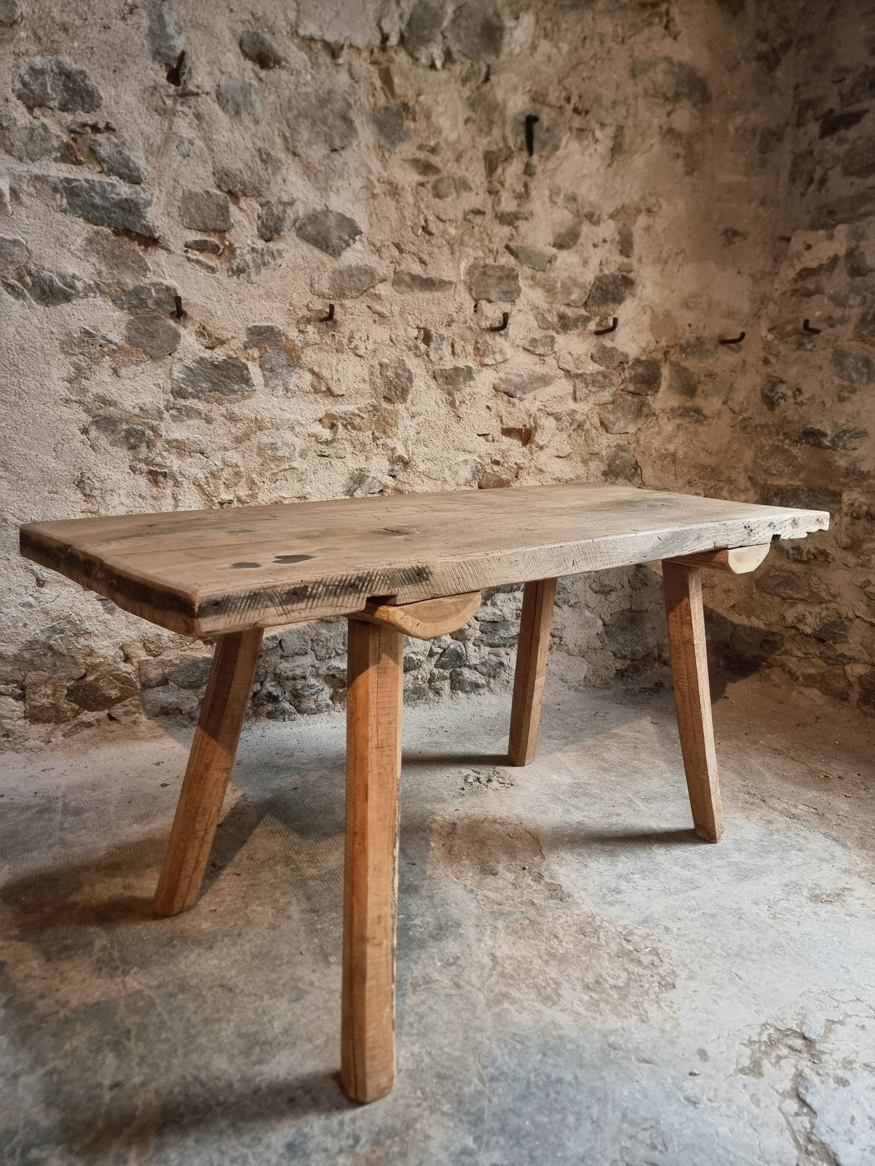 Antique work table / primitive dining table in oak, Hungary, circa 1900–1930.