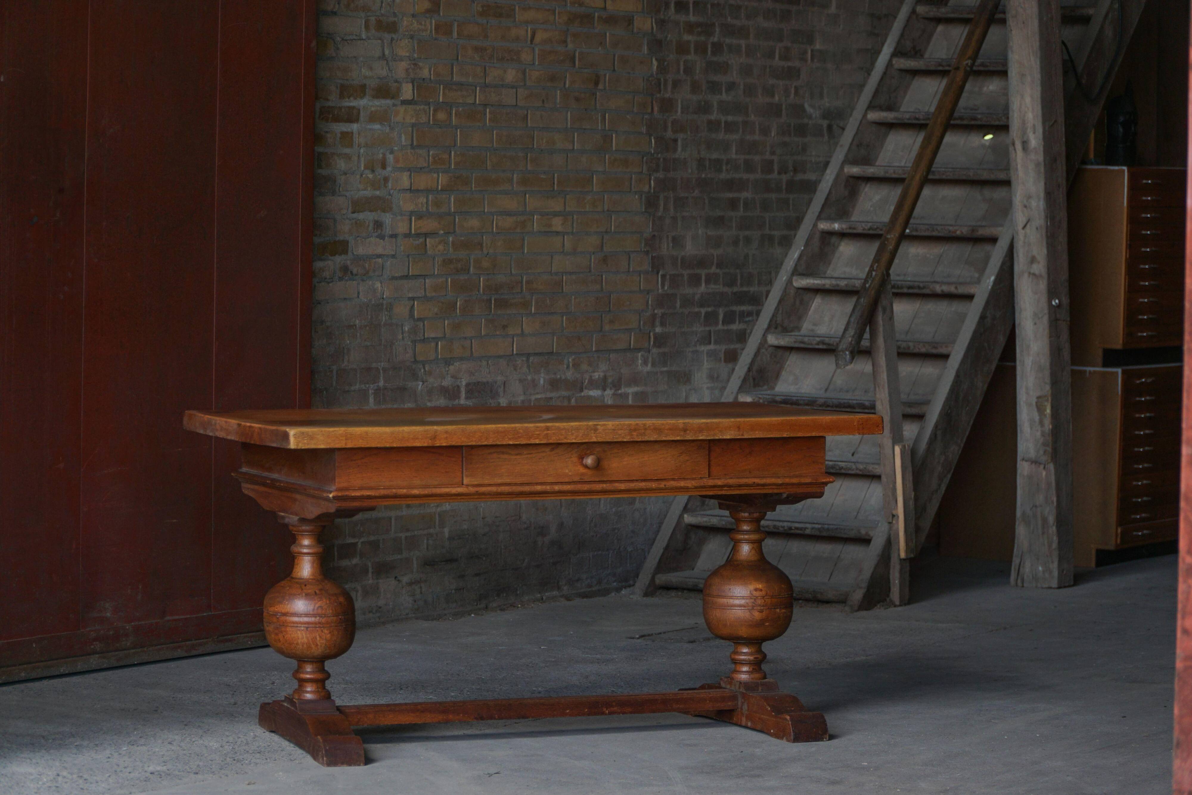 Baroque writing desk from the 1920s in solid oak, by a Danish cabinetmaker.