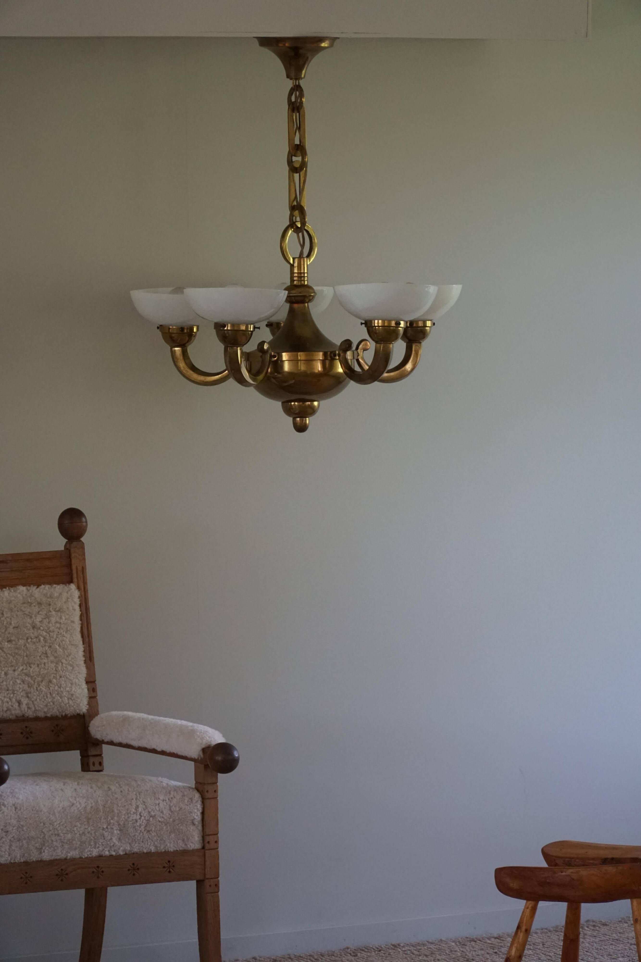 A modern Danish Art Deco chandelier, glass and brass, 1940s.