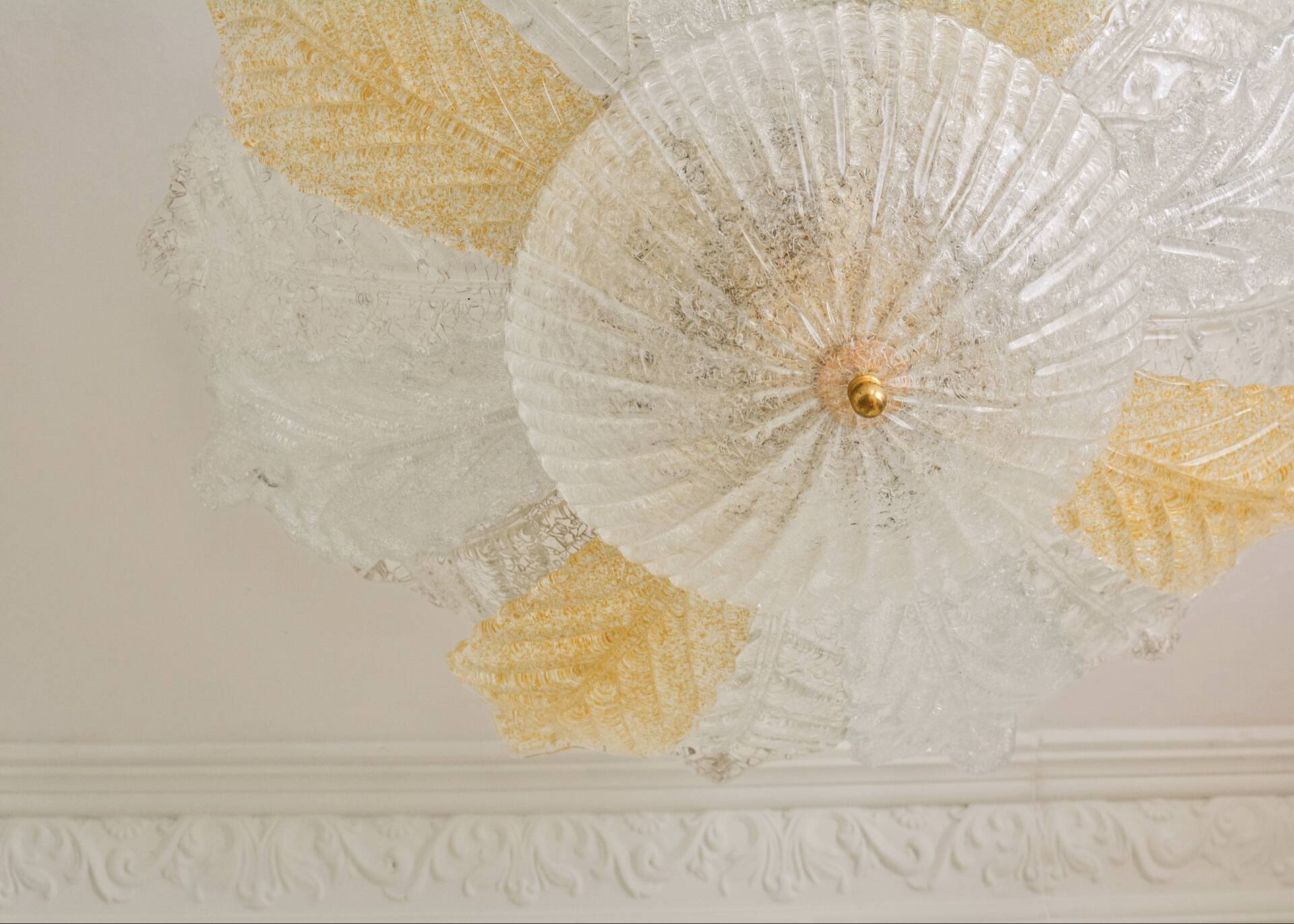Vintage Murano chandelier/ceiling light with 16 white and amber leaves.