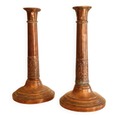 Pair of antique copper candlesticks