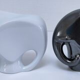 Two iridescent black and white ceramic elephants design