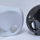 Two iridescent black and white ceramic elephants design