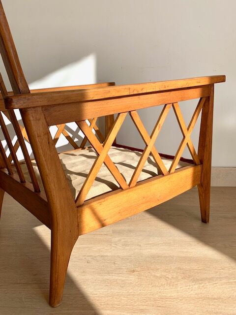 Pair of vintage wooden armchairs with braces