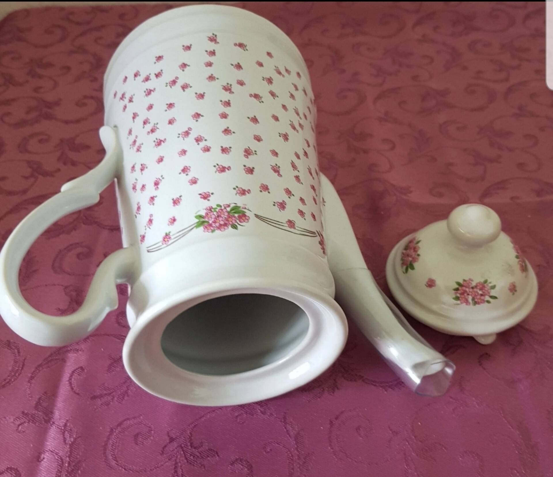 Flowered teapot, made in Korea.