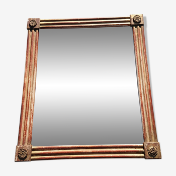 Miroir ancien en bois doré avec rosaces