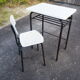 Schoolboy style desk with its white adult size chair