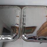 2 rectangular silver-plated metal dishes with an 80s pattern.