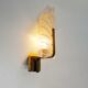 Pair of brass and glass wall lamps by Carl Fagerlund for Orrefors
