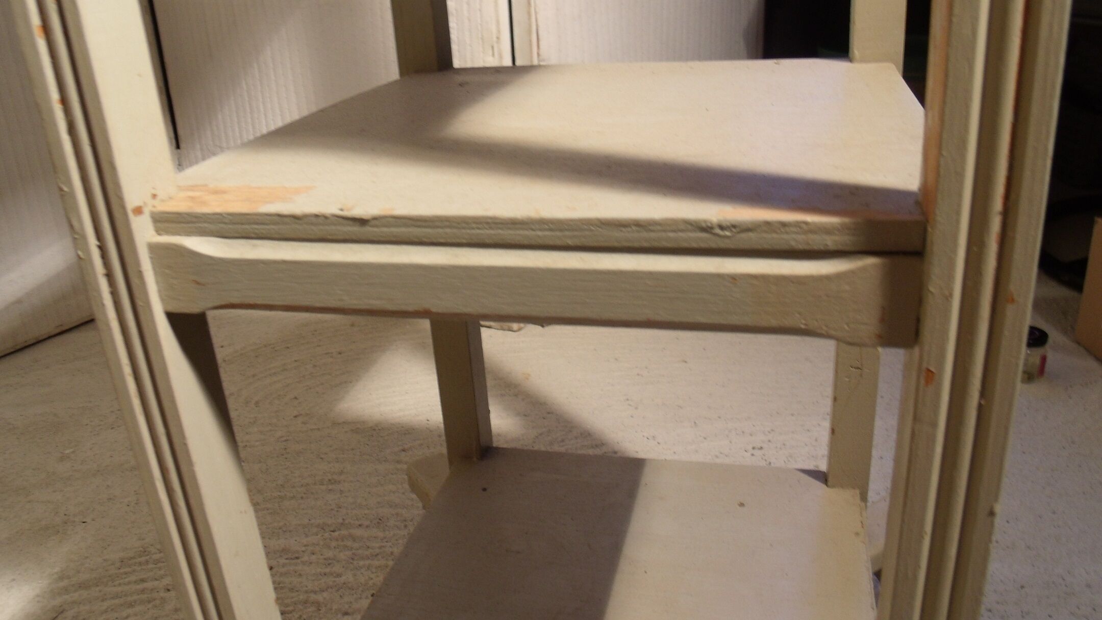 shabby wood side table on wheels