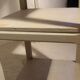shabby wood side table on wheels