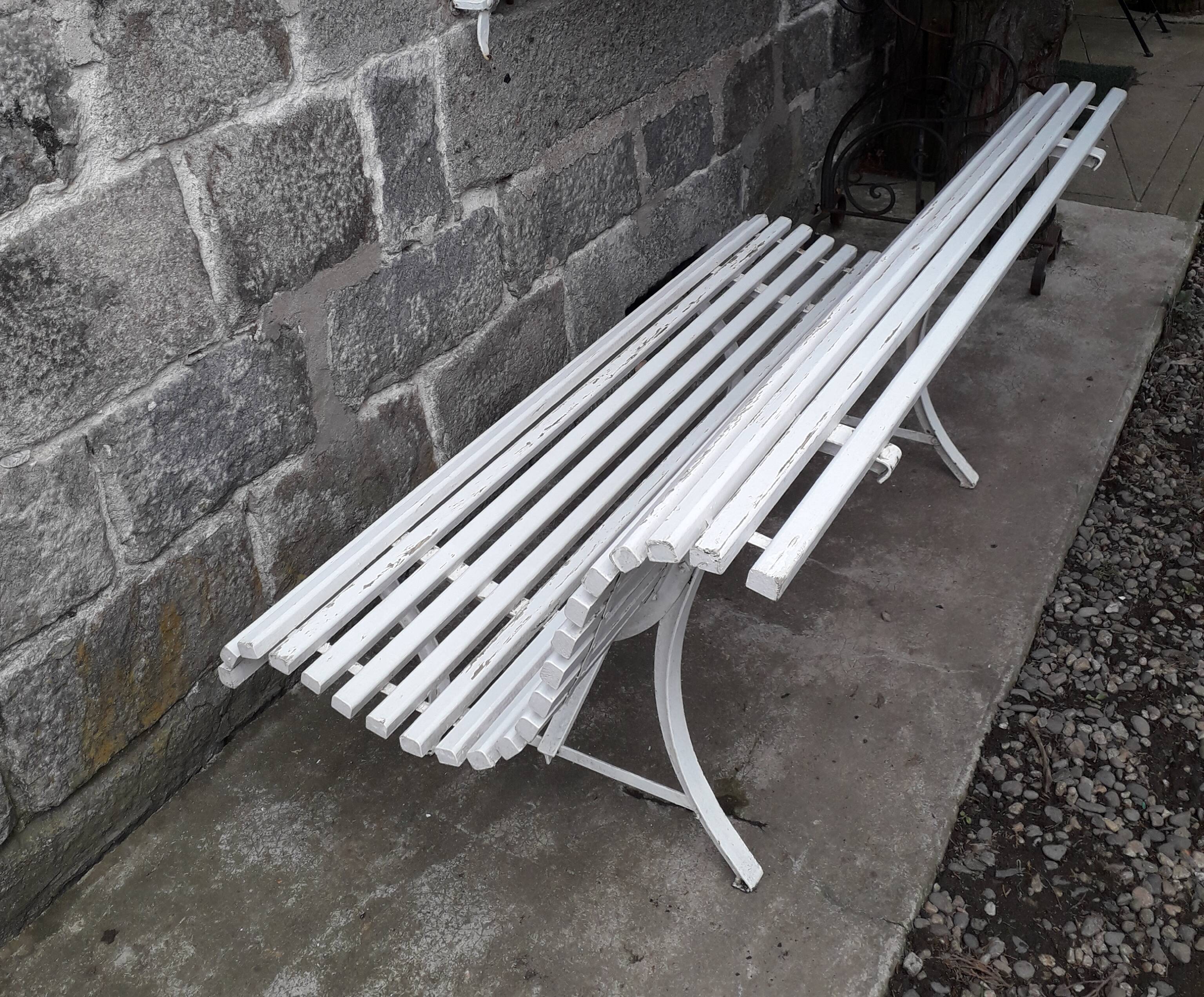 White garden slat bench