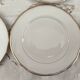 Set of 6 fine porcelain dessert plates from Bohemia with a gold rim.