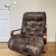 1970s Scandinavian armchair in curved laminated wood with a leather seat.