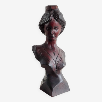 Wooden bust of a woman