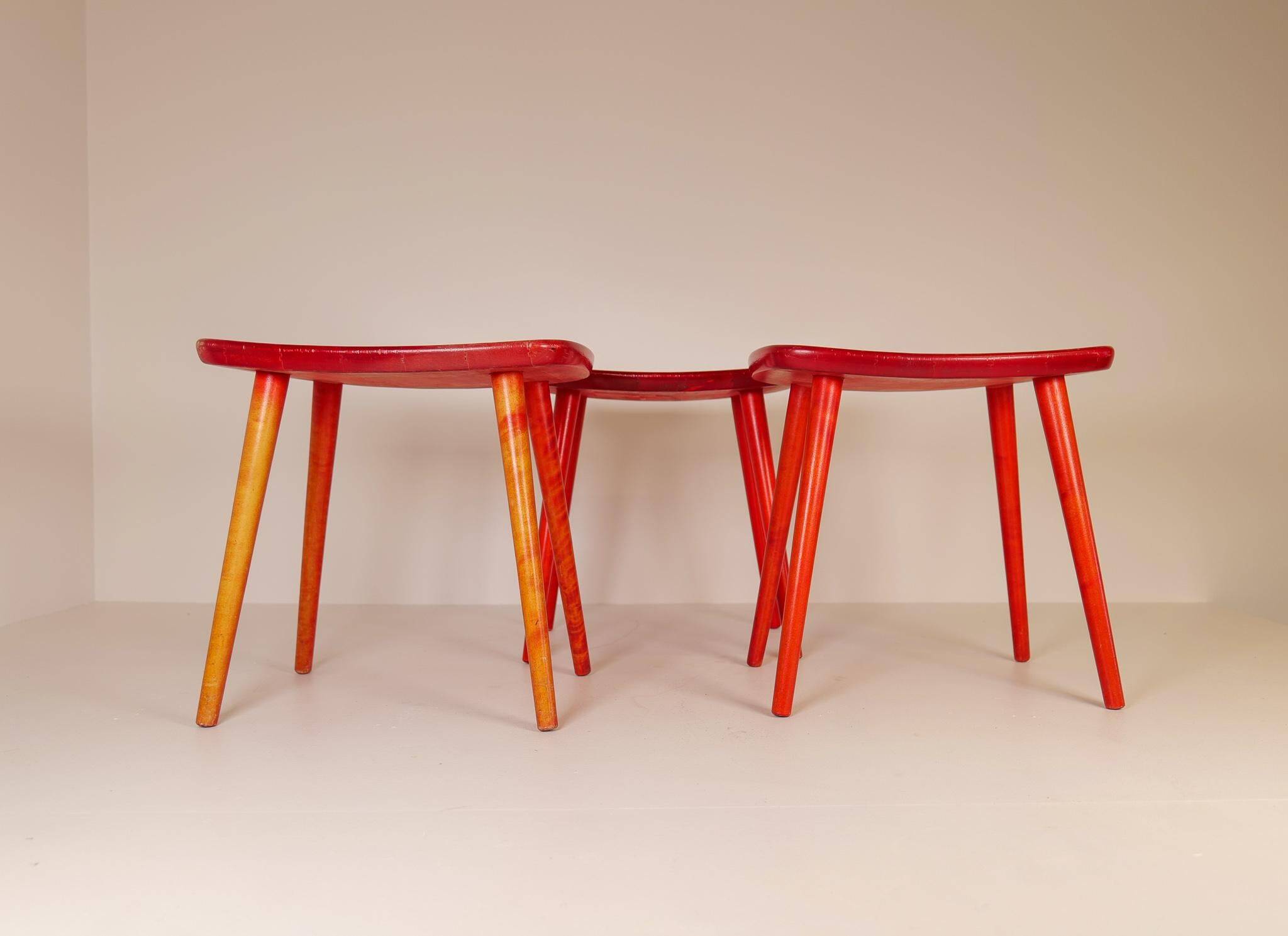 Swedish stools in red lacquered birch, Yngve Ekström "Palle", 1970s