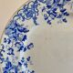 Vintage round dish in iron earth