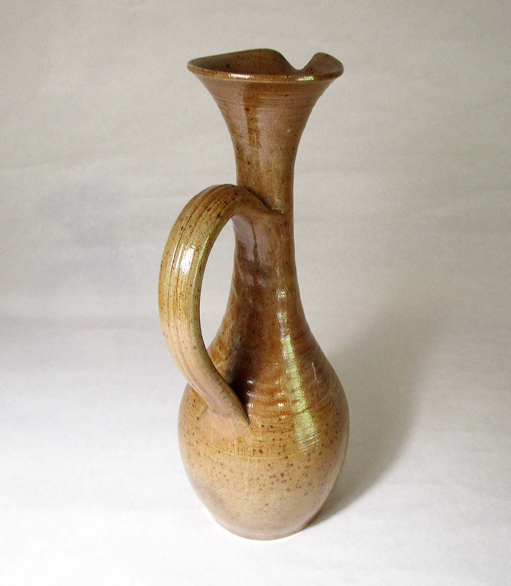Elongated sandstone vase