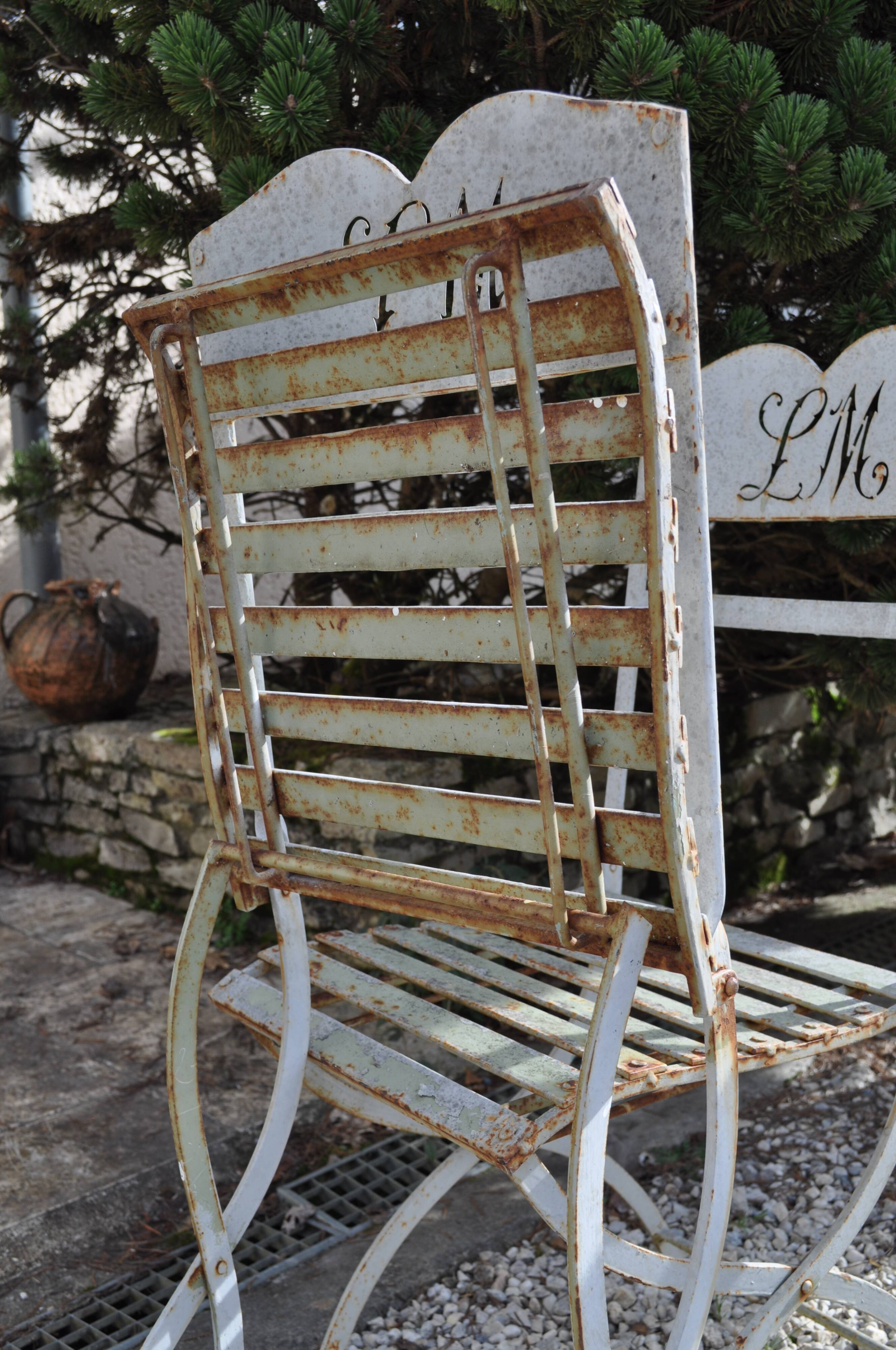 L M monogrammed metal garden chairs