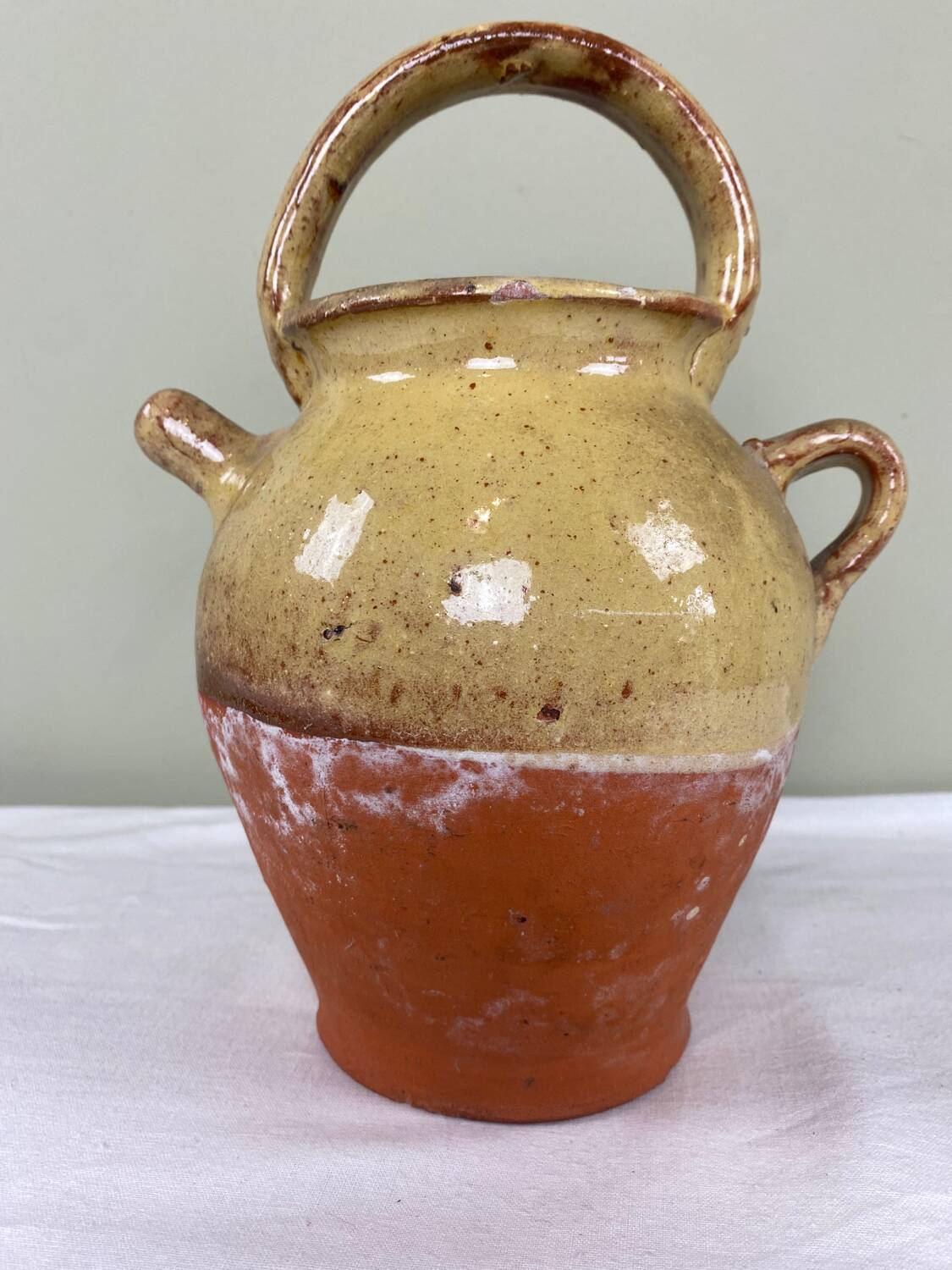 Glazed terracotta jug