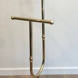 Neoclassical style valet stand in brass and black lacquered wood. French work. Circa 1940