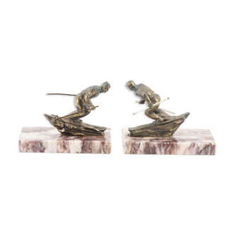 Pair serre books art deco skiers