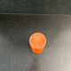 Orange glazed ceramic cylinder vase
