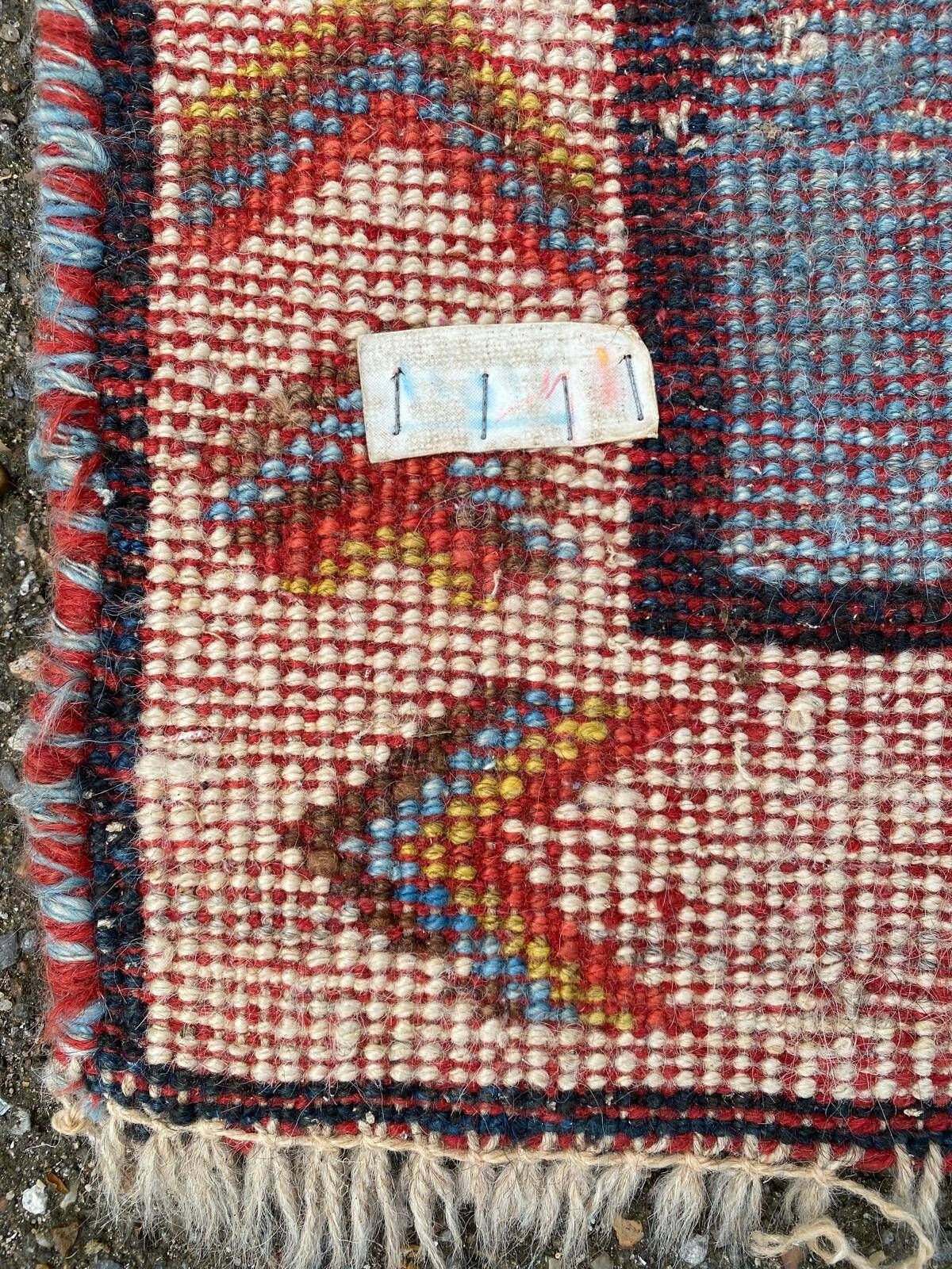 Handmade wool Berber rug with long pile, 110x150cm.