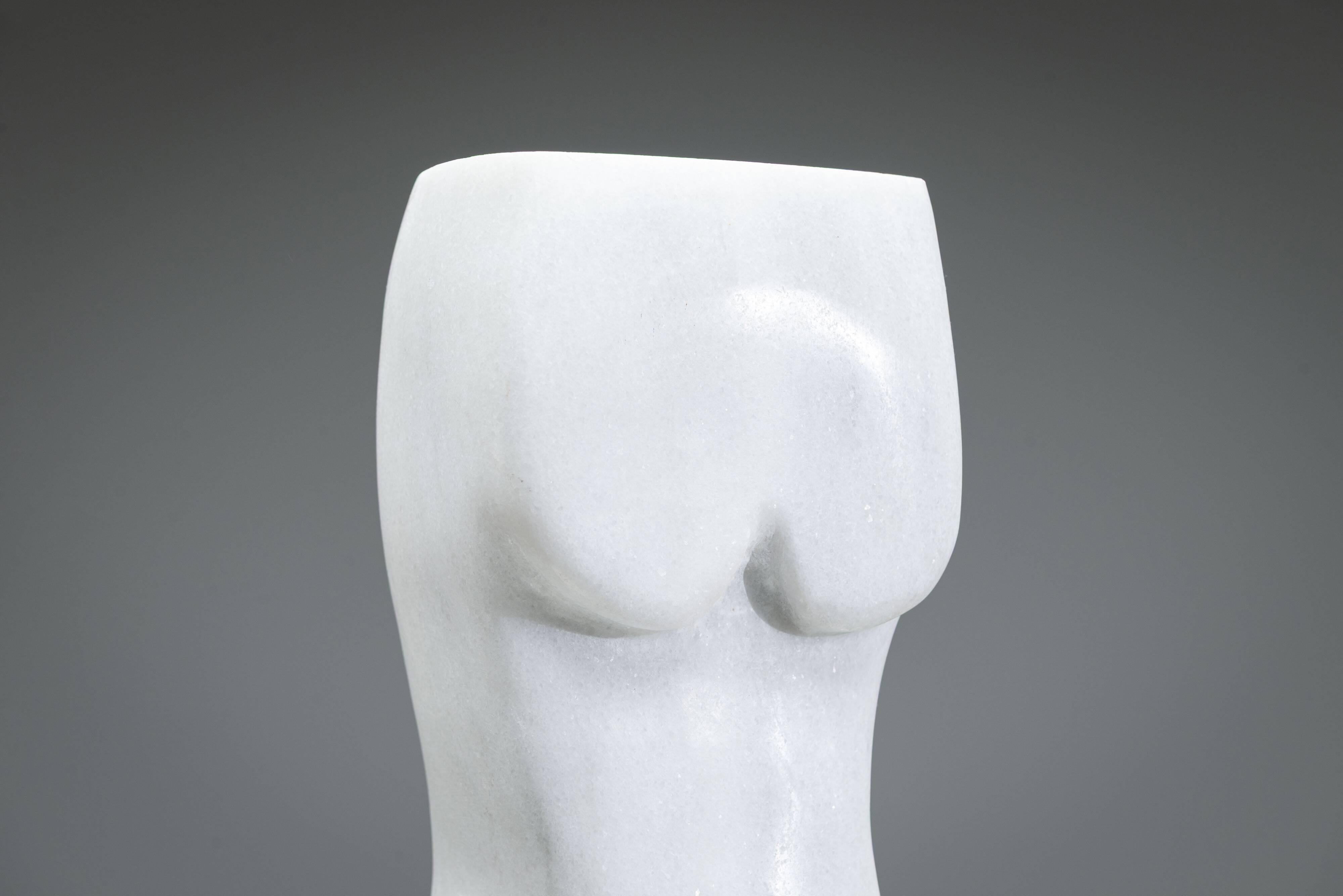 Abstract solid white marble torso