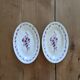 Pair of Moulin des loups dishes
