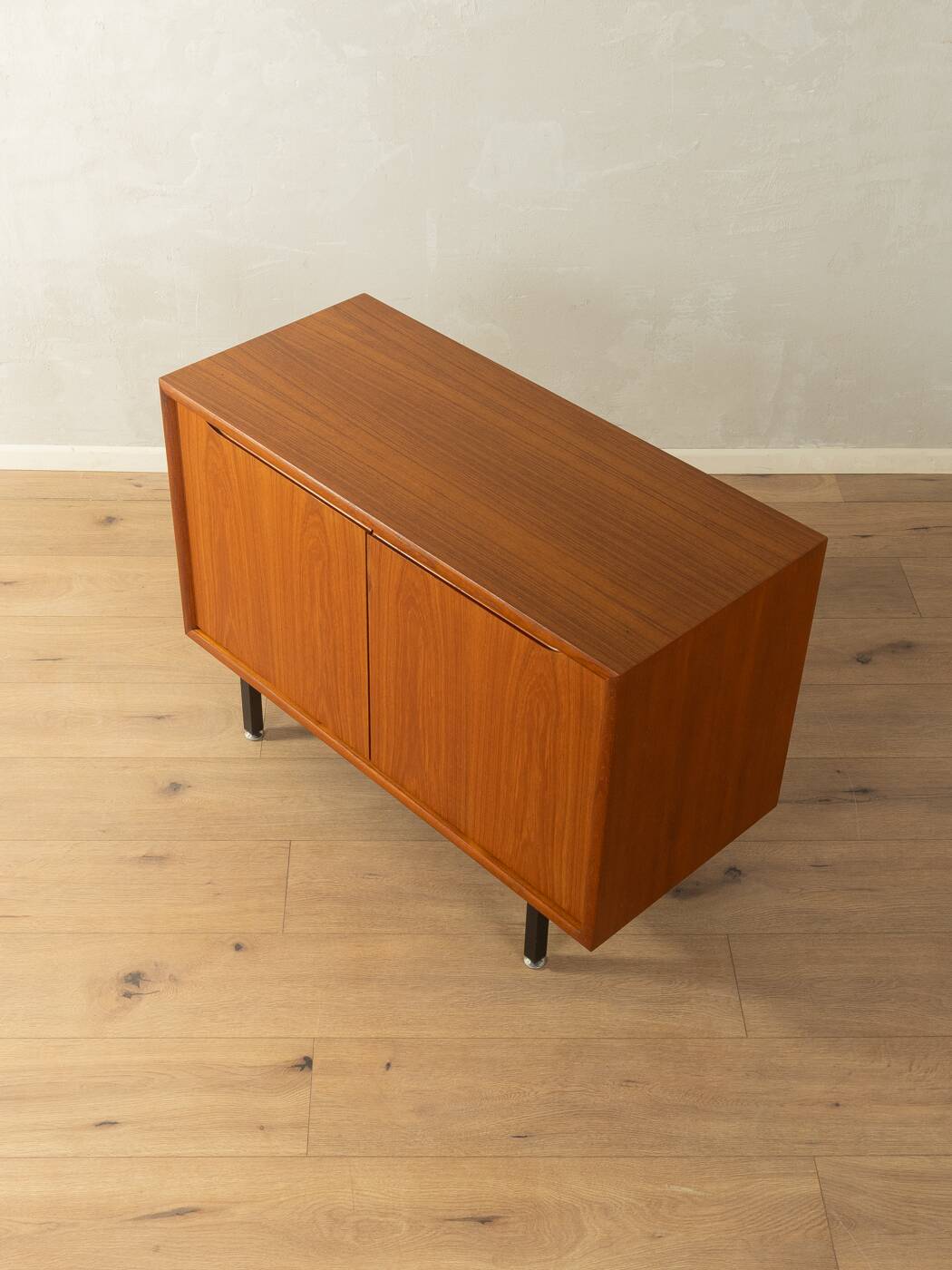 Classic chest of drawers from the 1960s with practical, closed storage space